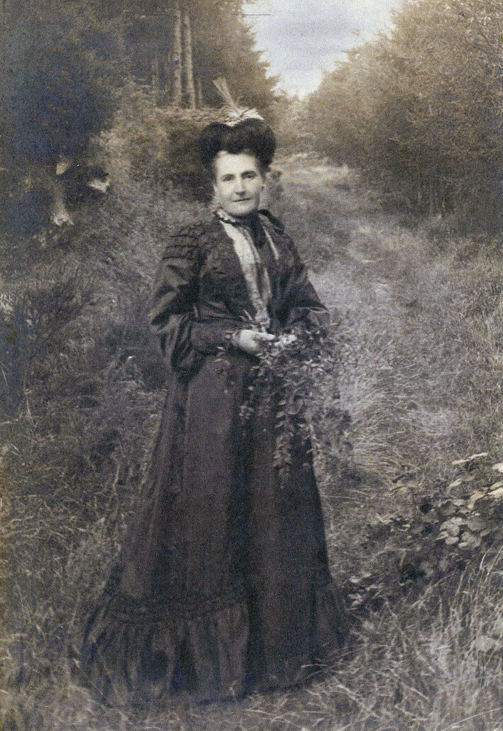 Elizabeth Glover nee Lester taking a walk through the Axnfell Plantation aged about 59, the Photo was taken by her son Charles Wallace Glover c.1903